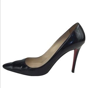 Christian Louboutin “red bottoms” pumps